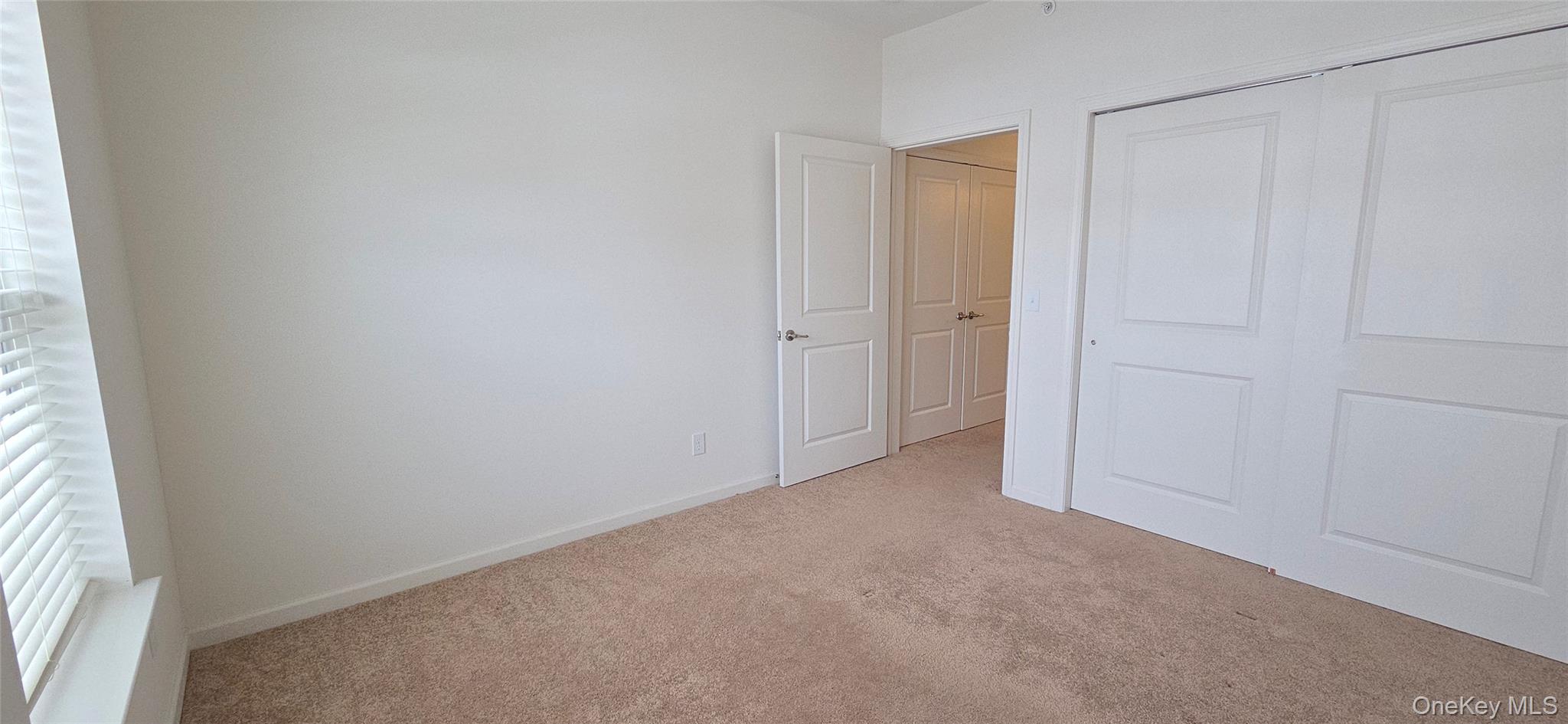 41 Greentree Court Shirley, NY 11967 - Photo 20 of 29 Guest bedroom with double closet