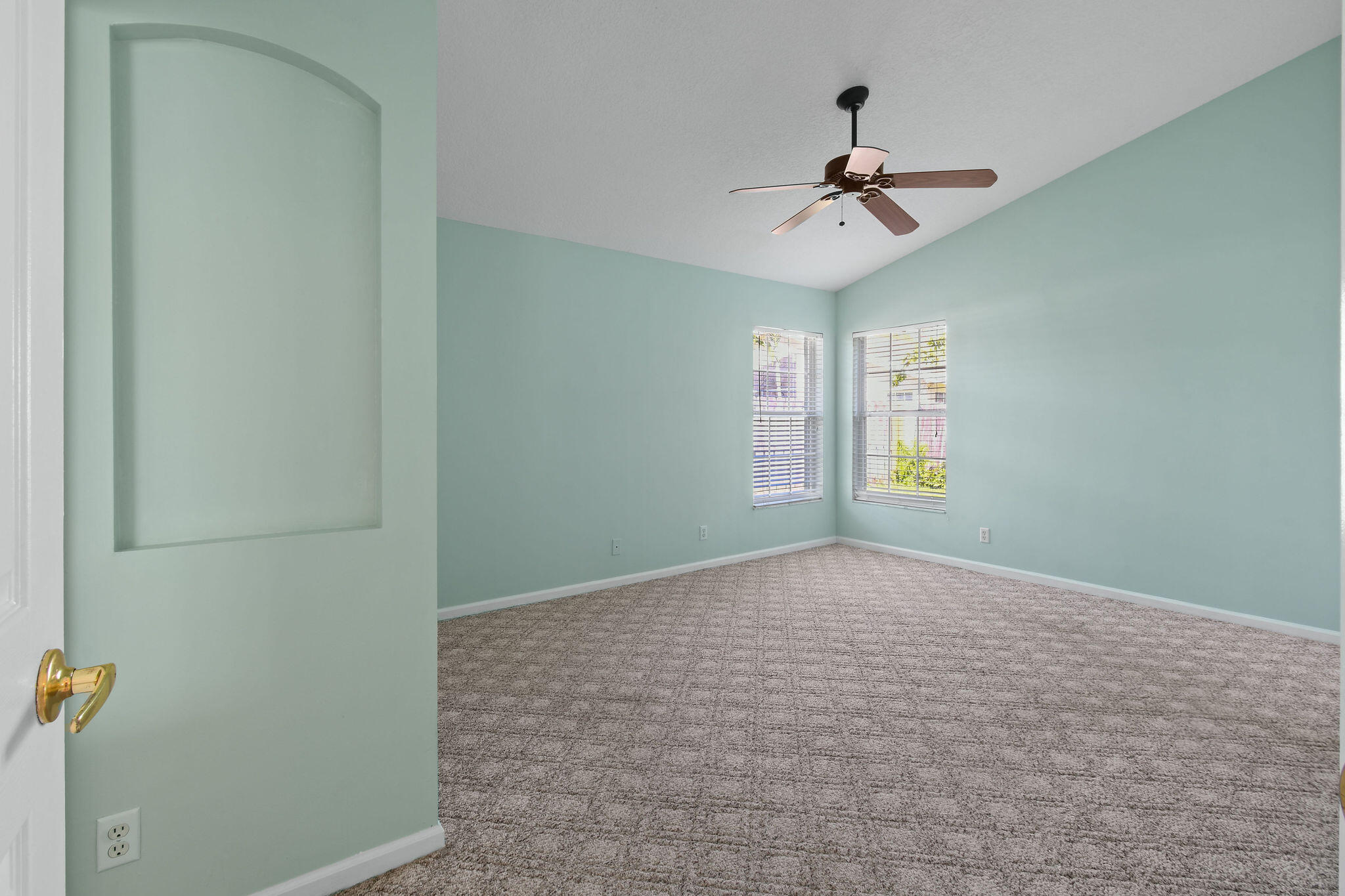 6293 Michael Street Jupiter, FL 33458 - Photo 19 of 64 a view of an empty room with a window