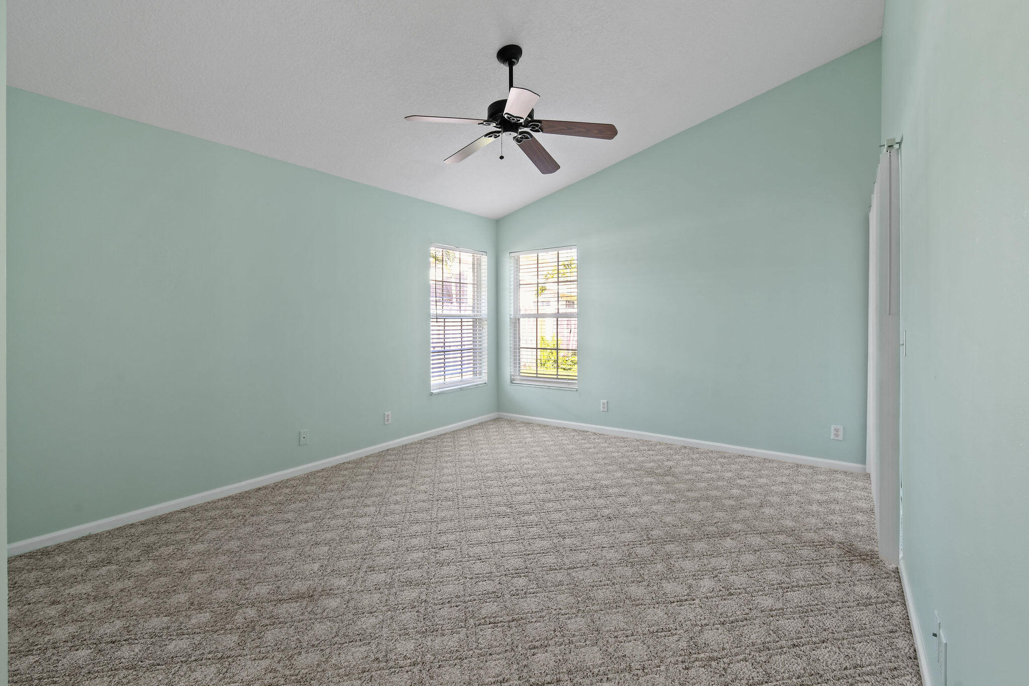 6293 Michael Street Jupiter, FL 33458 - Photo 20 of 64 a view of an empty room and a window