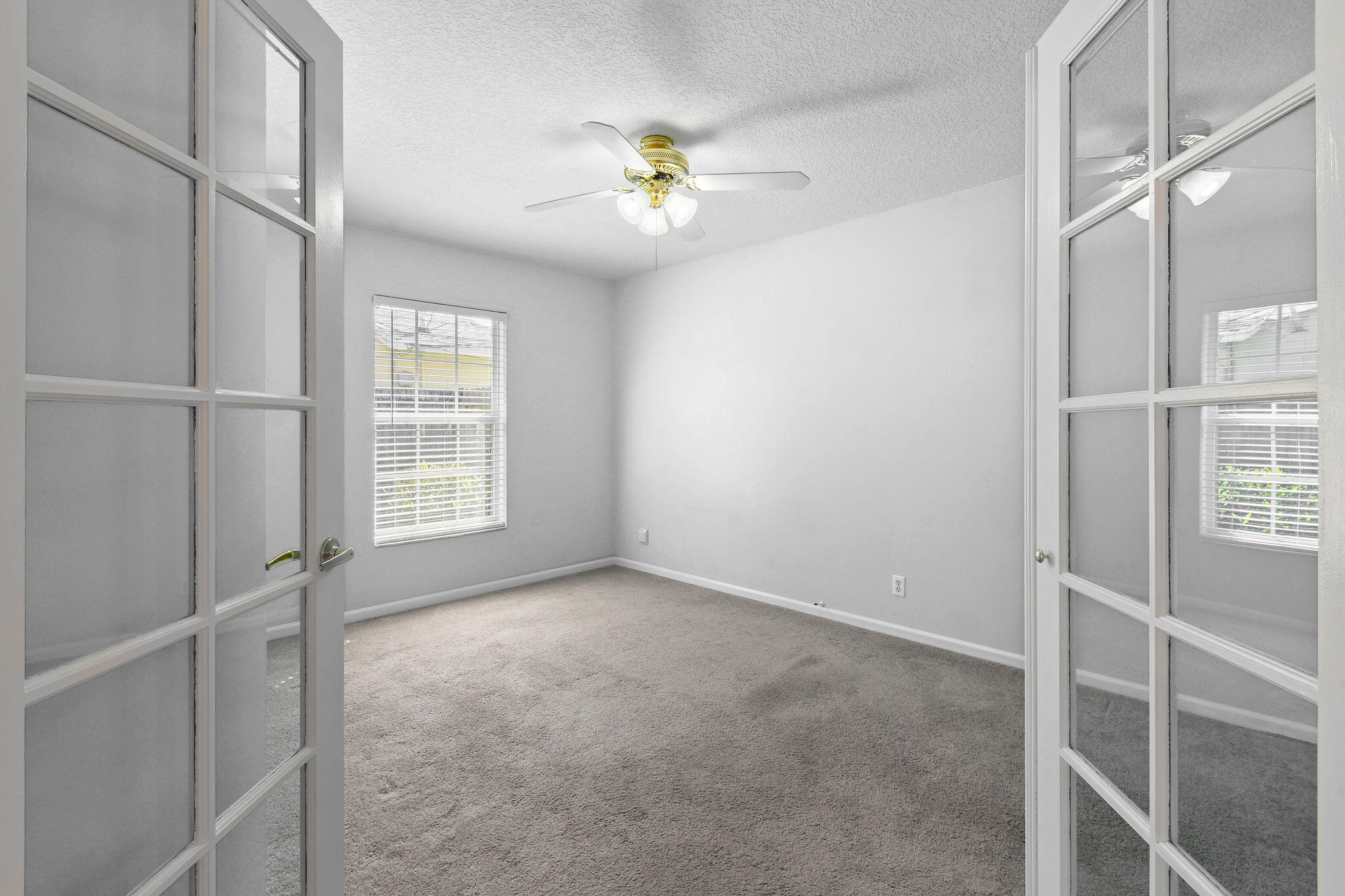 6293 Michael Street Jupiter, FL 33458 - Photo 30 of 64 a view of an empty room with a window