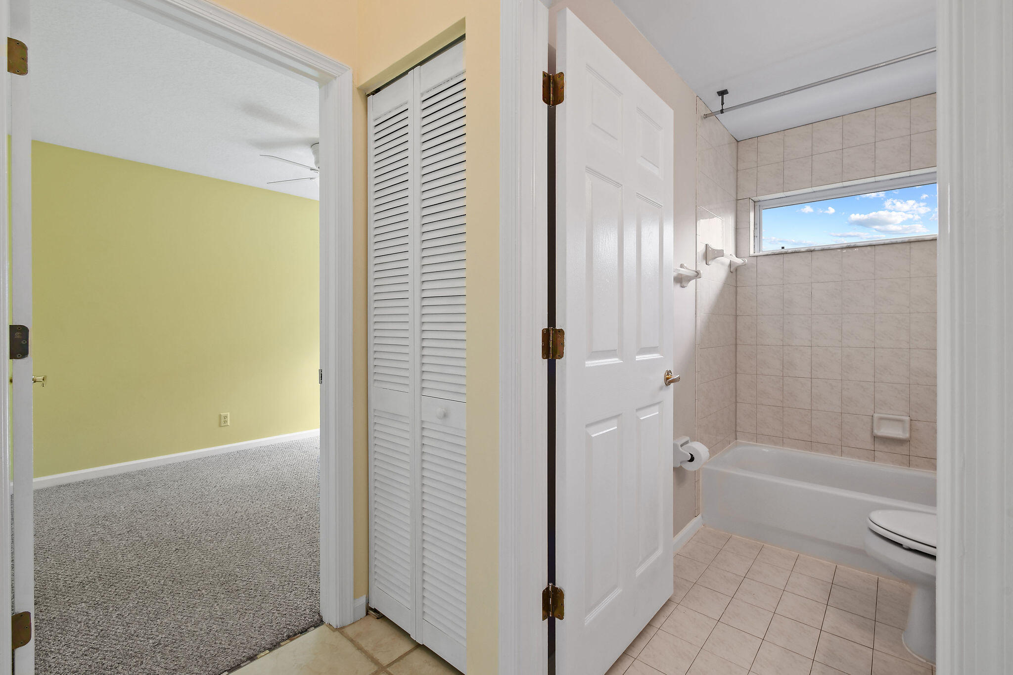 6293 Michael Street Jupiter, FL 33458 - Photo 34 of 64 a bathroom with a bathtub and a shower