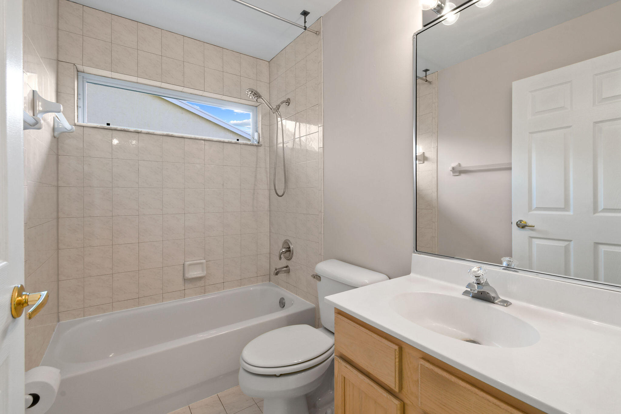 6293 Michael Street Jupiter, FL 33458 - Photo 35 of 64 a bathroom with a sink toilet and shower