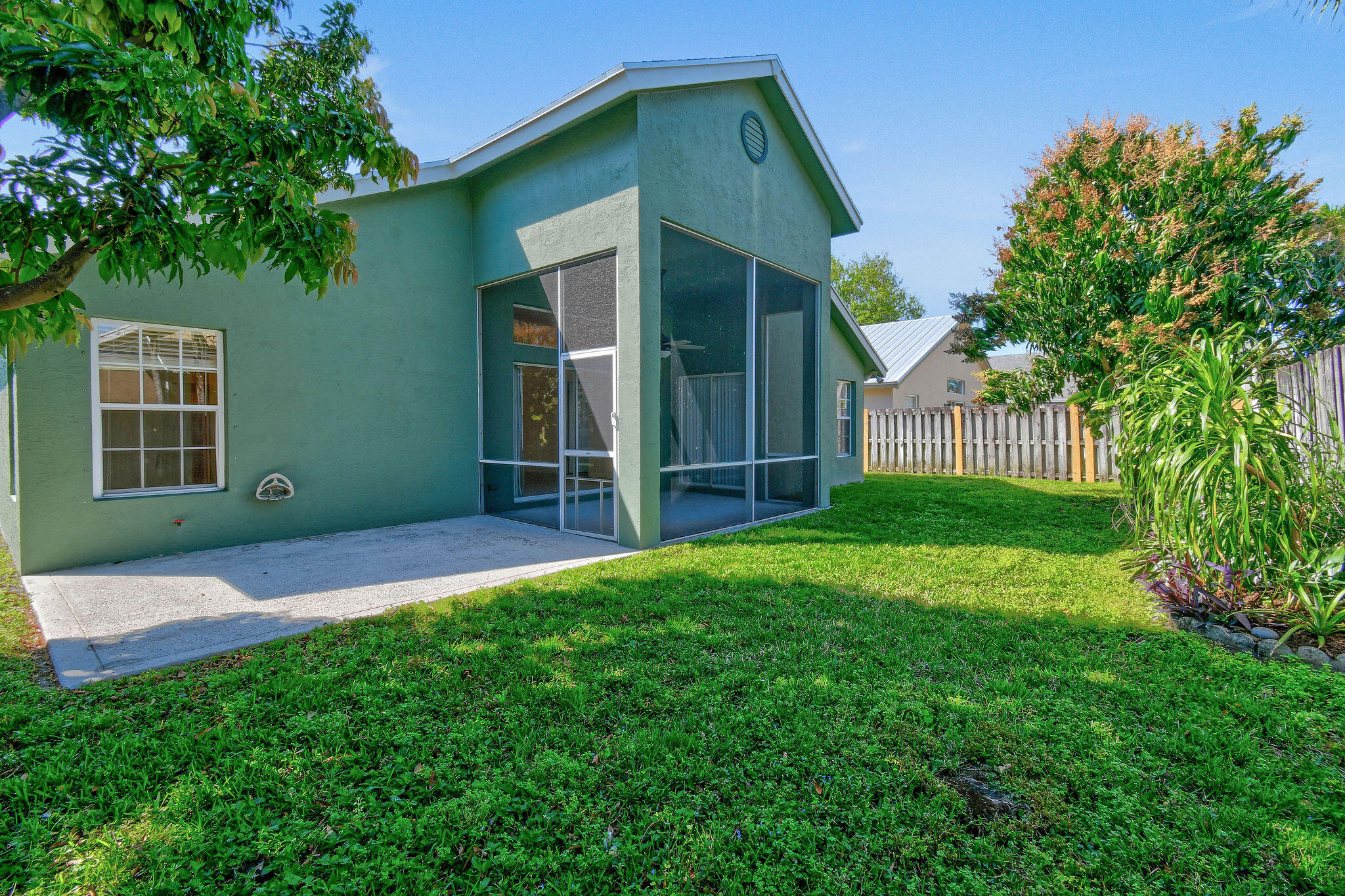 6293 Michael Street Jupiter, FL 33458 - Photo 42 of 64 a view of front of a house with a yard