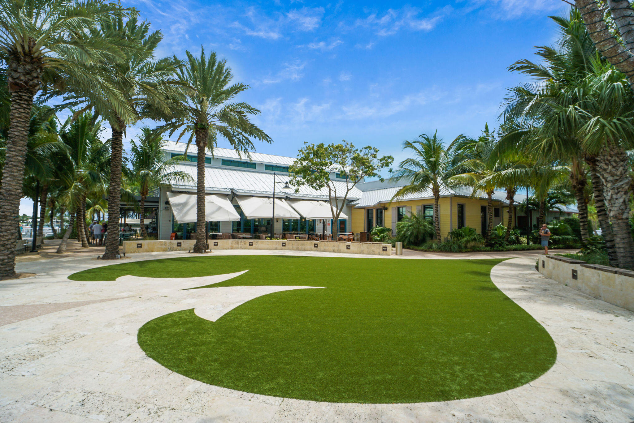 6293 Michael Street Jupiter, FL 33458 - Photo 57 of 64 a view of a swimming pool with a garden