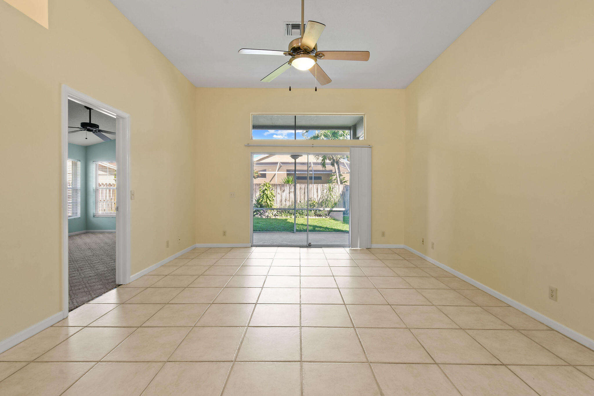 6293 Michael Street Jupiter, FL 33458 - Photo 6 of 64 a view of an empty room and window