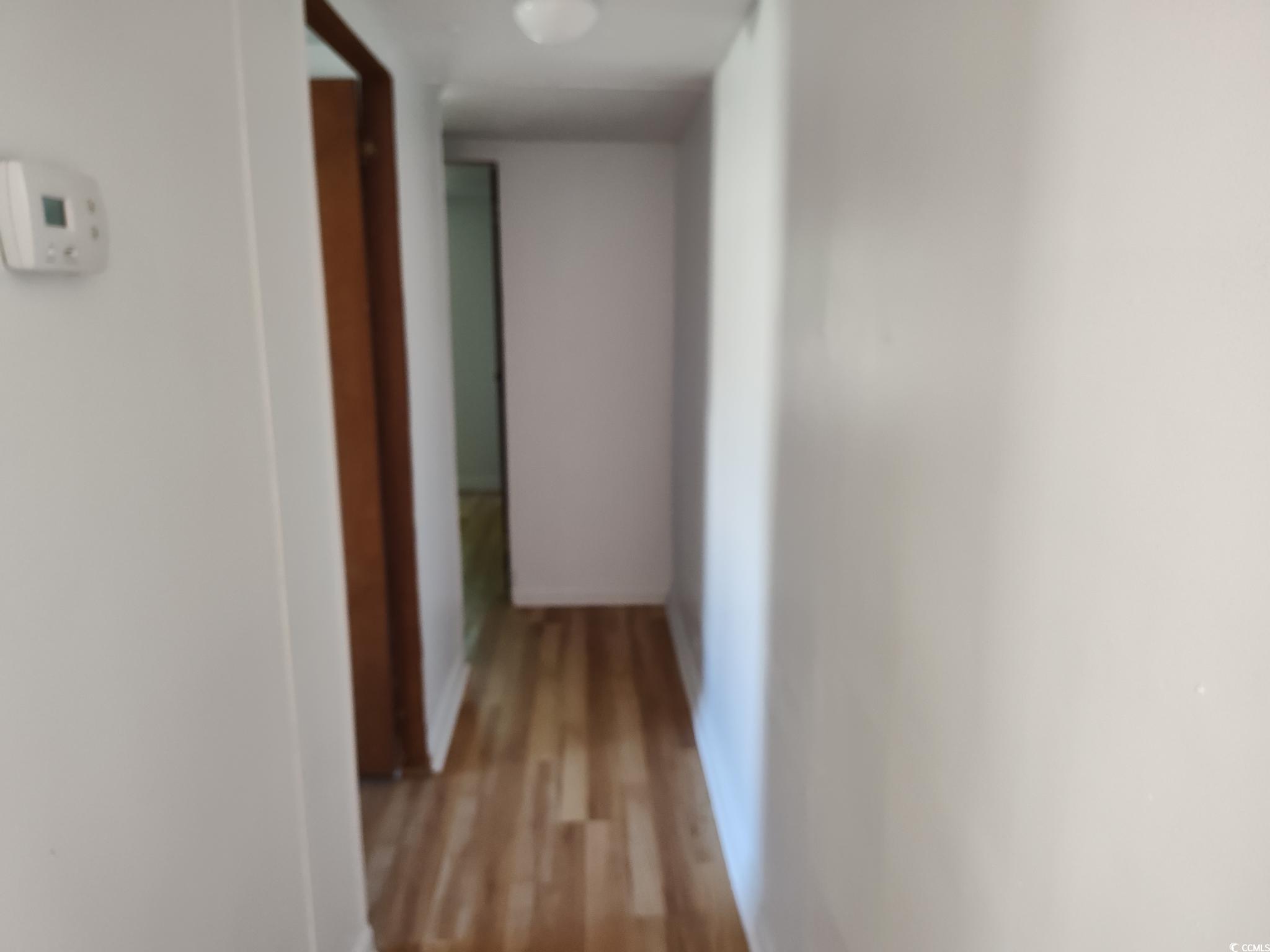 43 Newton Trail Andrews, SC 29510 - Photo 4 of 7 Corridor featuring light wood-type flooring