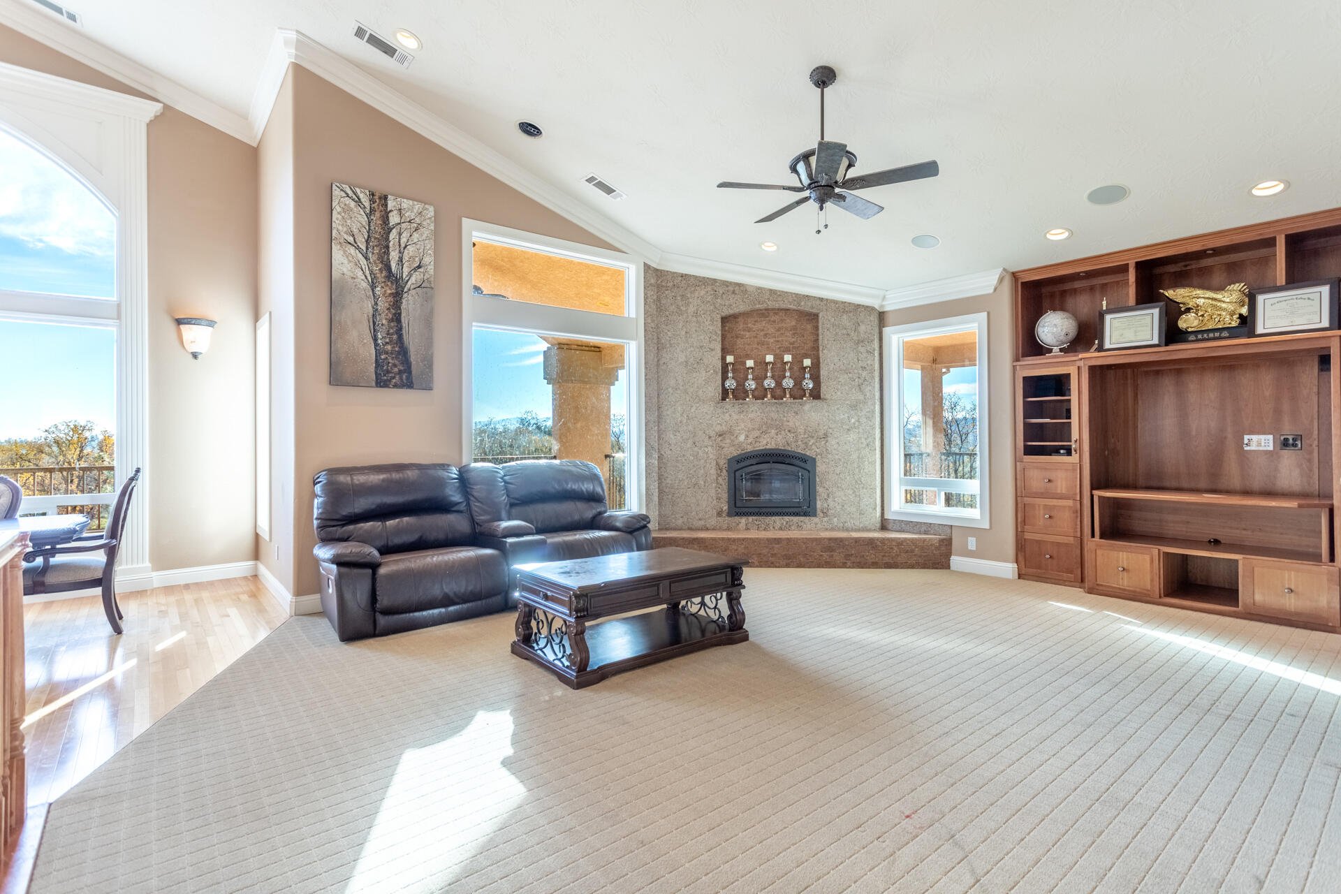 7775 Muletown Road Redding, CA 96001 - Photo 15 of 46 a living room with furniture and a fireplace