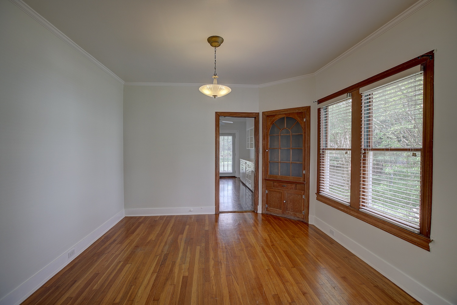 1708 Olive Street Georgetown, TX 78626 - Photo 6 of 40 a view of empty room with wooden floor and fan