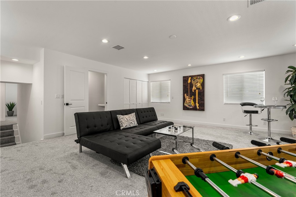 1872 Parkview Circle Costa Mesa, CA 92627 - Photo 29 of 49 a living room with furniture and a window