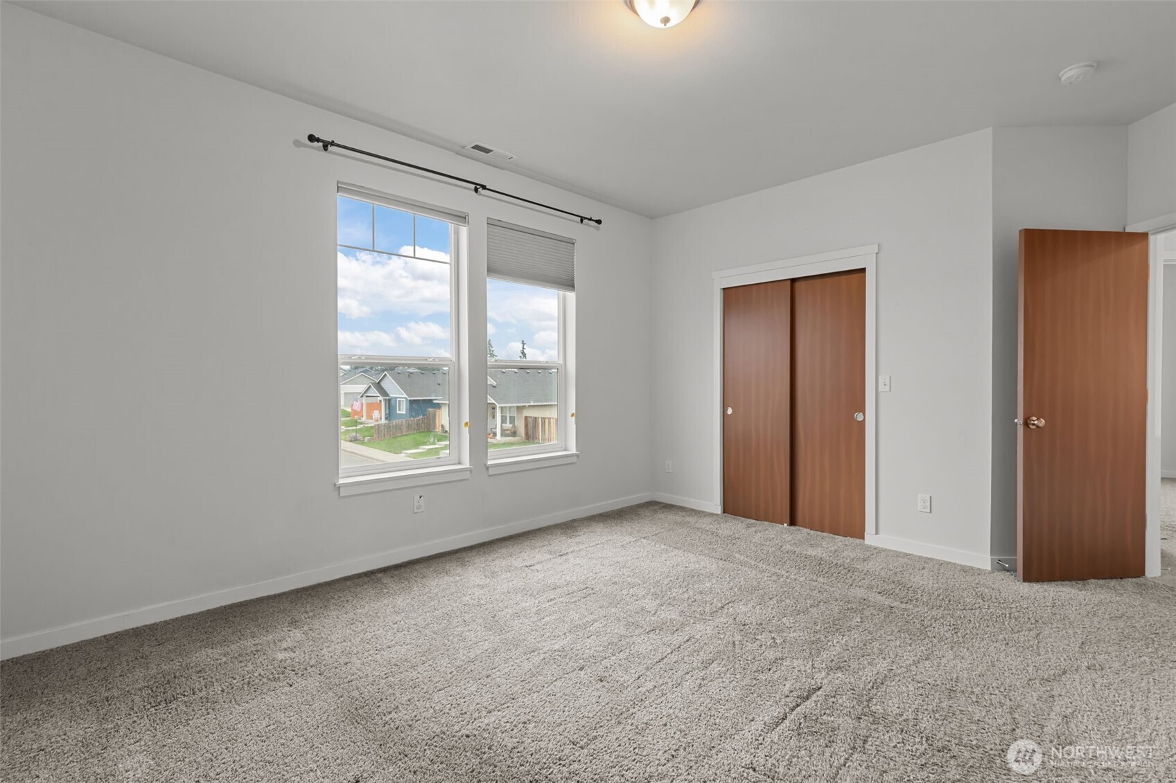 708 Miller Street Winlock, WA 98596 - Photo 17 of 40 an empty room with windows