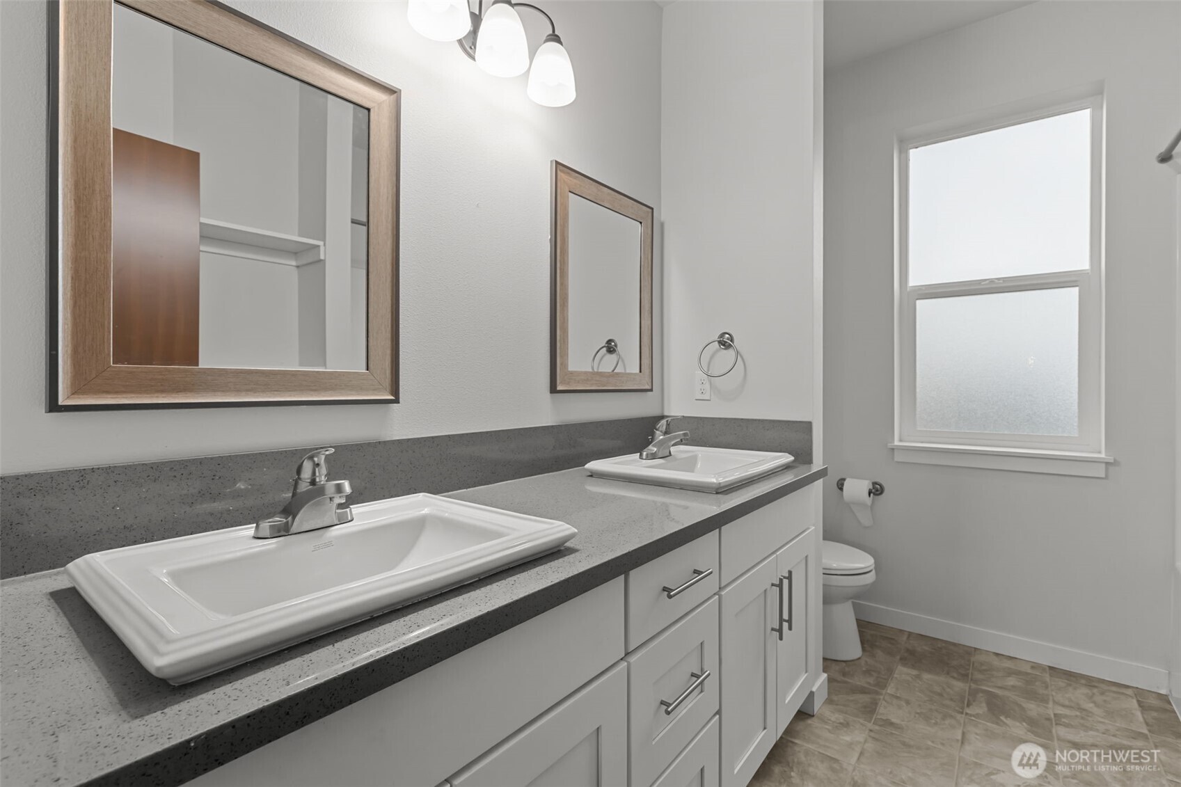 708 Miller Street Winlock, WA 98596 - Photo 26 of 40 a bathroom with a sink and a toilet