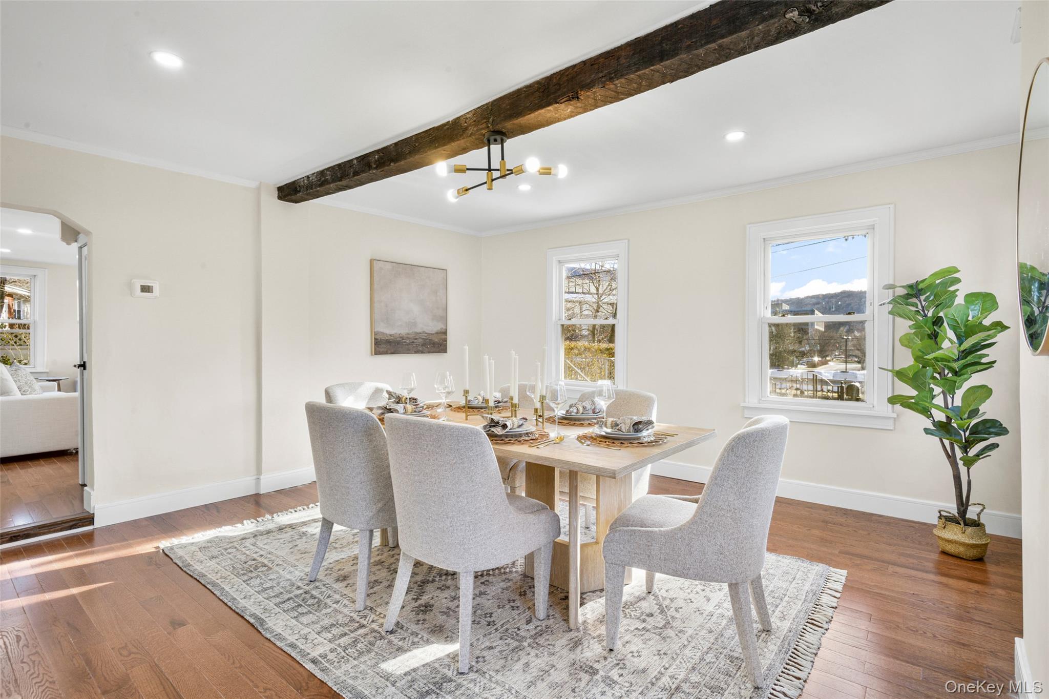 103 Old White Plains Road Tarrytown, NY 10591 - Photo 13 of 37 a view of a dining room with furniture and wooden floor