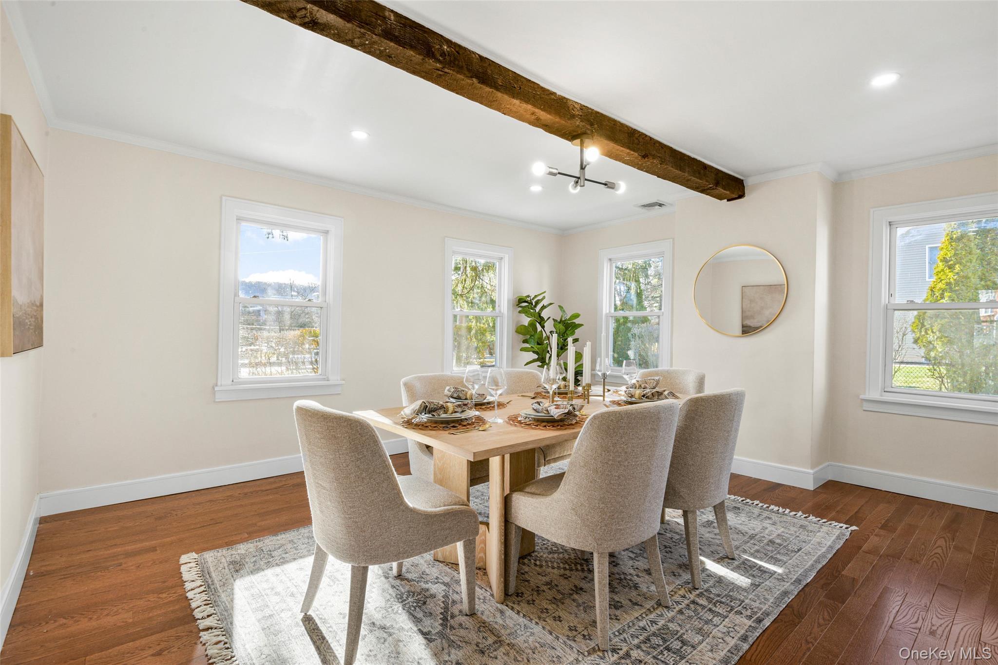 103 Old White Plains Road Tarrytown, NY 10591 - Photo 14 of 37 a view of a dining room with furniture and wooden floor