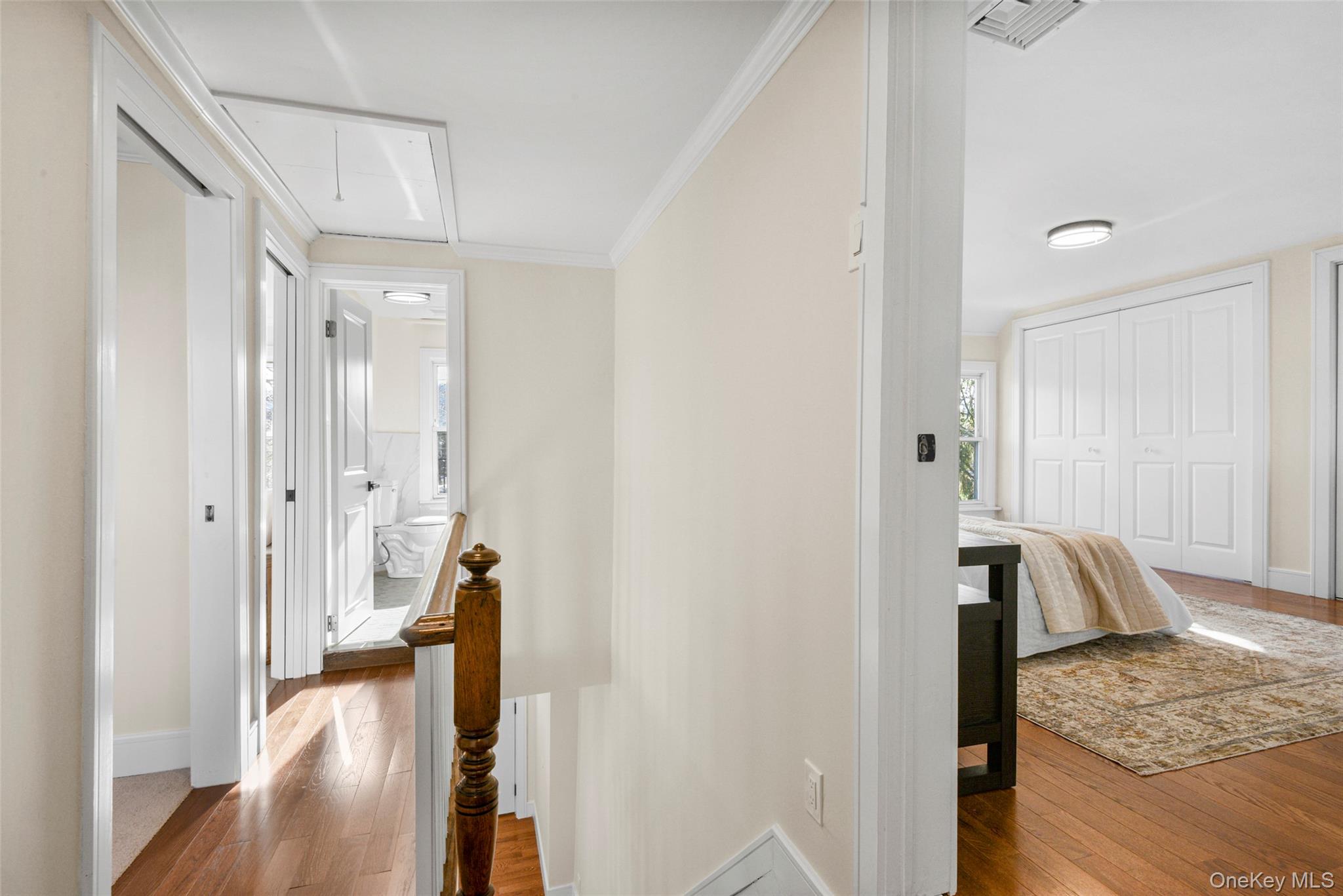 103 Old White Plains Road Tarrytown, NY 10591 - Photo 22 of 37 a view of a room that has a bed mirror and furniture