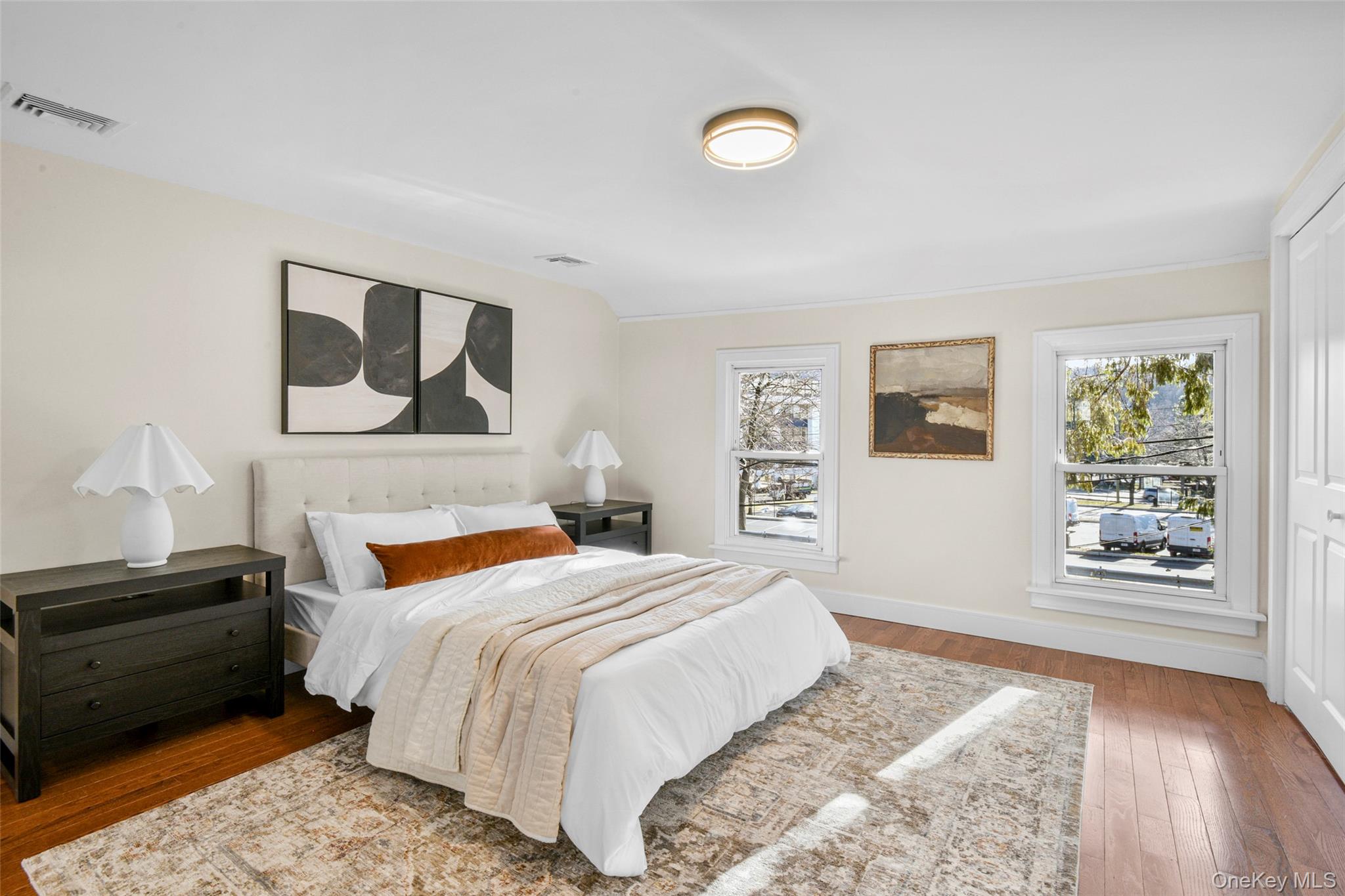 103 Old White Plains Road Tarrytown, NY 10591 - Photo 23 of 37 a bedroom with a bed and a window