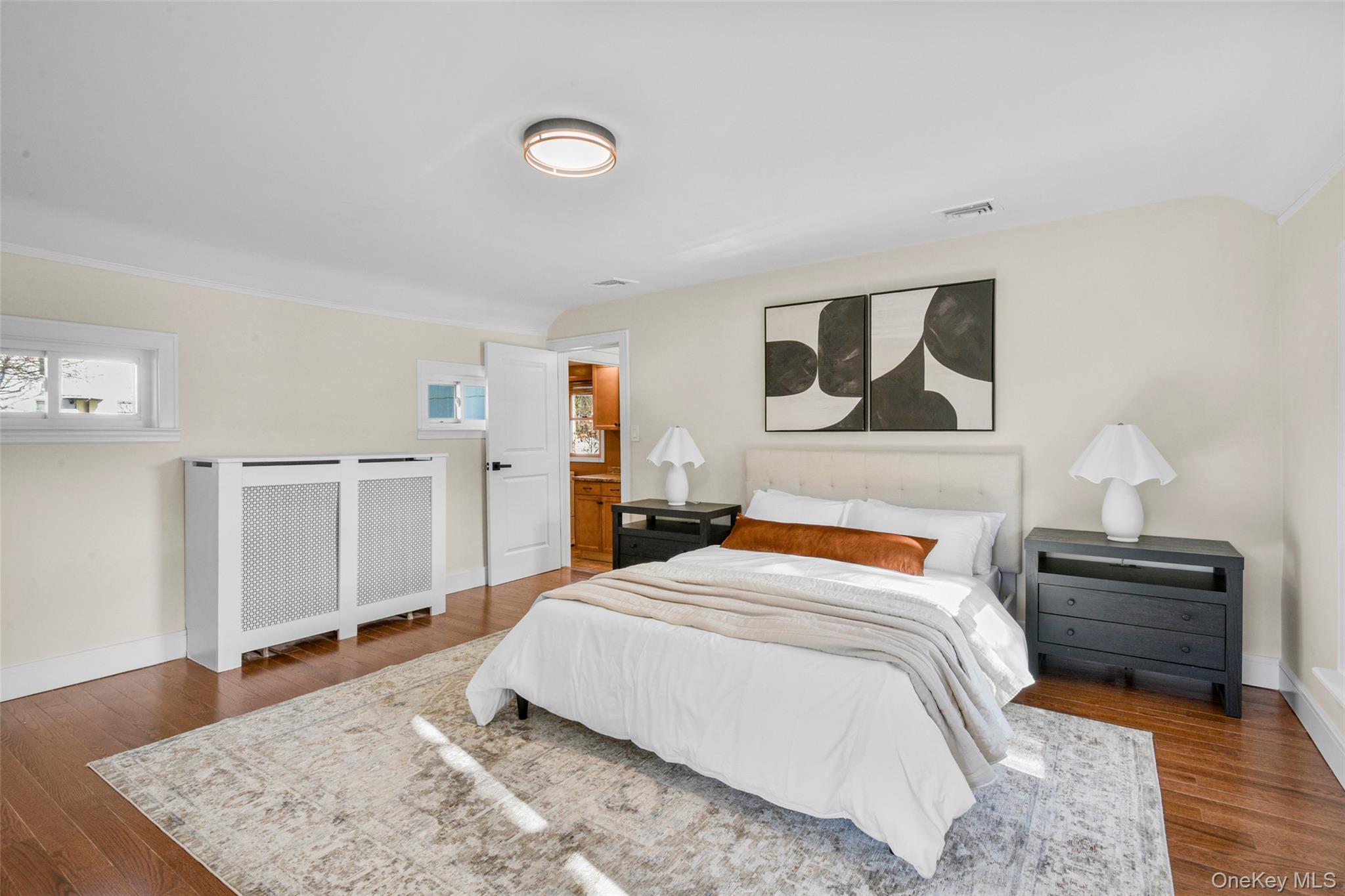 103 Old White Plains Road Tarrytown, NY 10591 - Photo 25 of 37 a bedroom with a bed and dresser