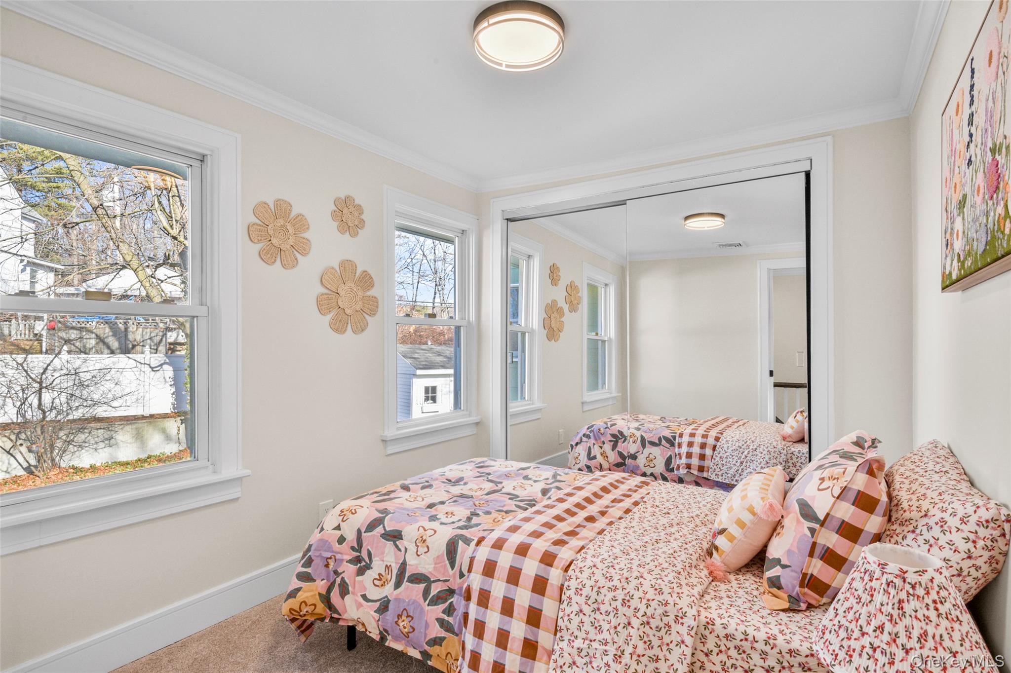103 Old White Plains Road Tarrytown, NY 10591 - Photo 26 of 37 a bedroom with a bed and a window
