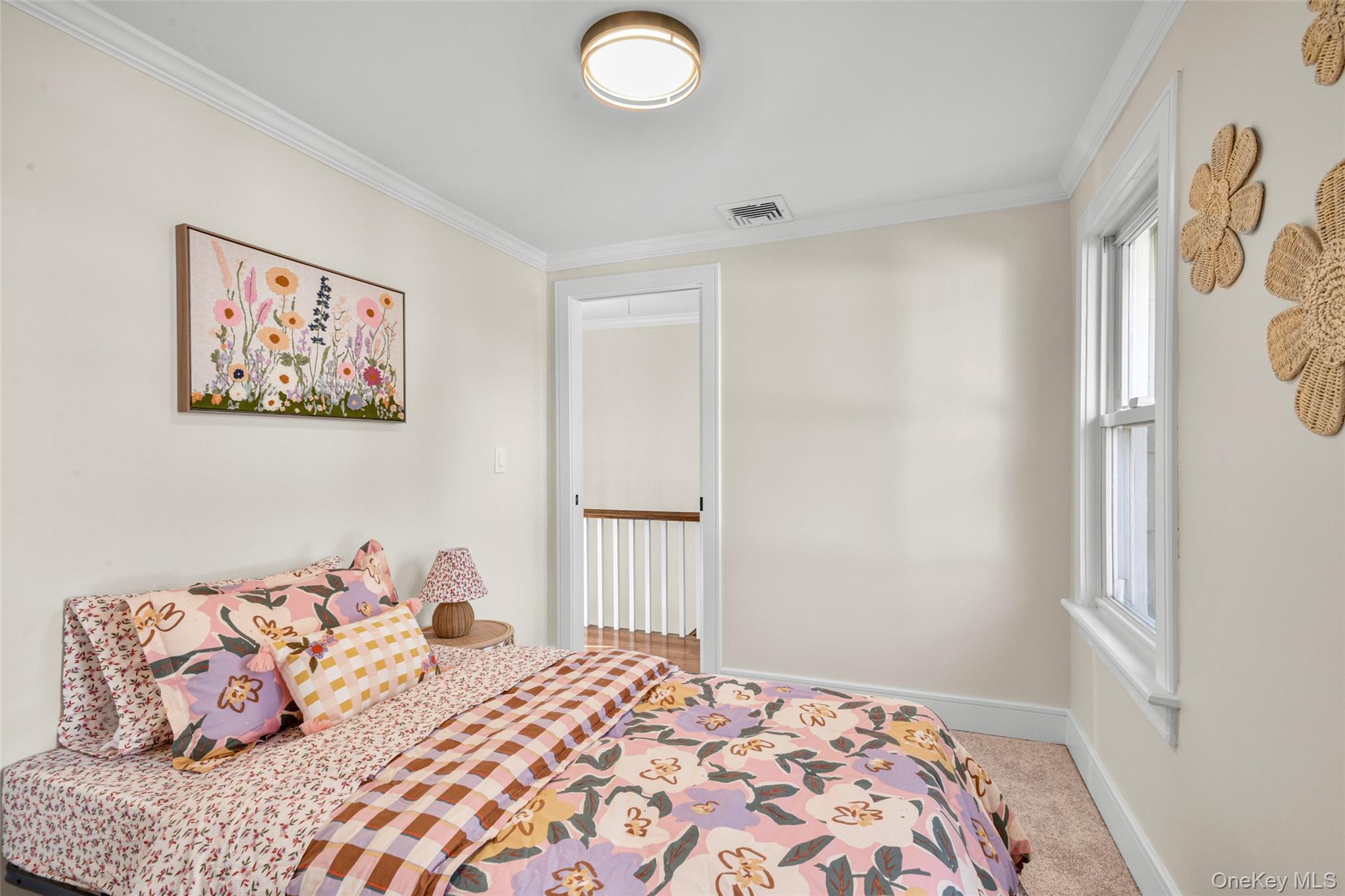 103 Old White Plains Road Tarrytown, NY 10591 - Photo 27 of 37 a bedroom with a bed and a window