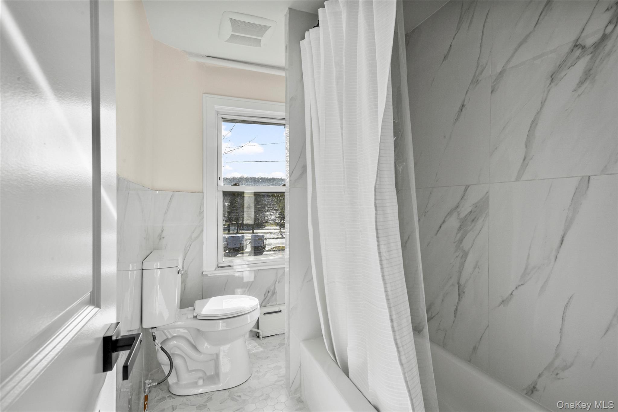 103 Old White Plains Road Tarrytown, NY 10591 - Photo 30 of 37 a bathroom with a toilet and a shower