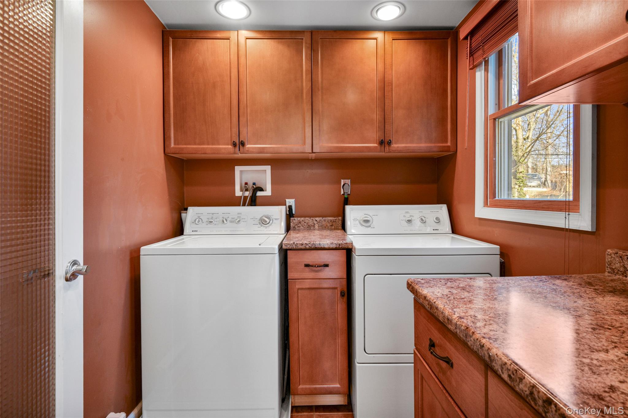 103 Old White Plains Road Tarrytown, NY 10591 - Photo 32 of 37 a utility room with dryer and washer