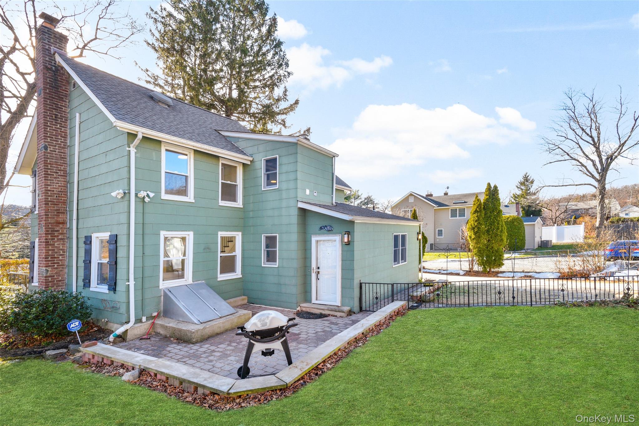 103 Old White Plains Road Tarrytown, NY 10591 - Photo 35 of 37 a view of a house with backyard and sitting area