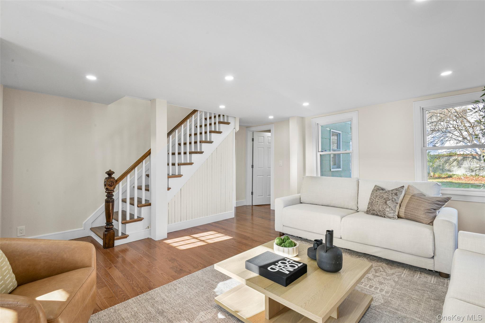 103 Old White Plains Road Tarrytown, NY 10591 - Photo 7 of 37 a living room with furniture and wooden floor