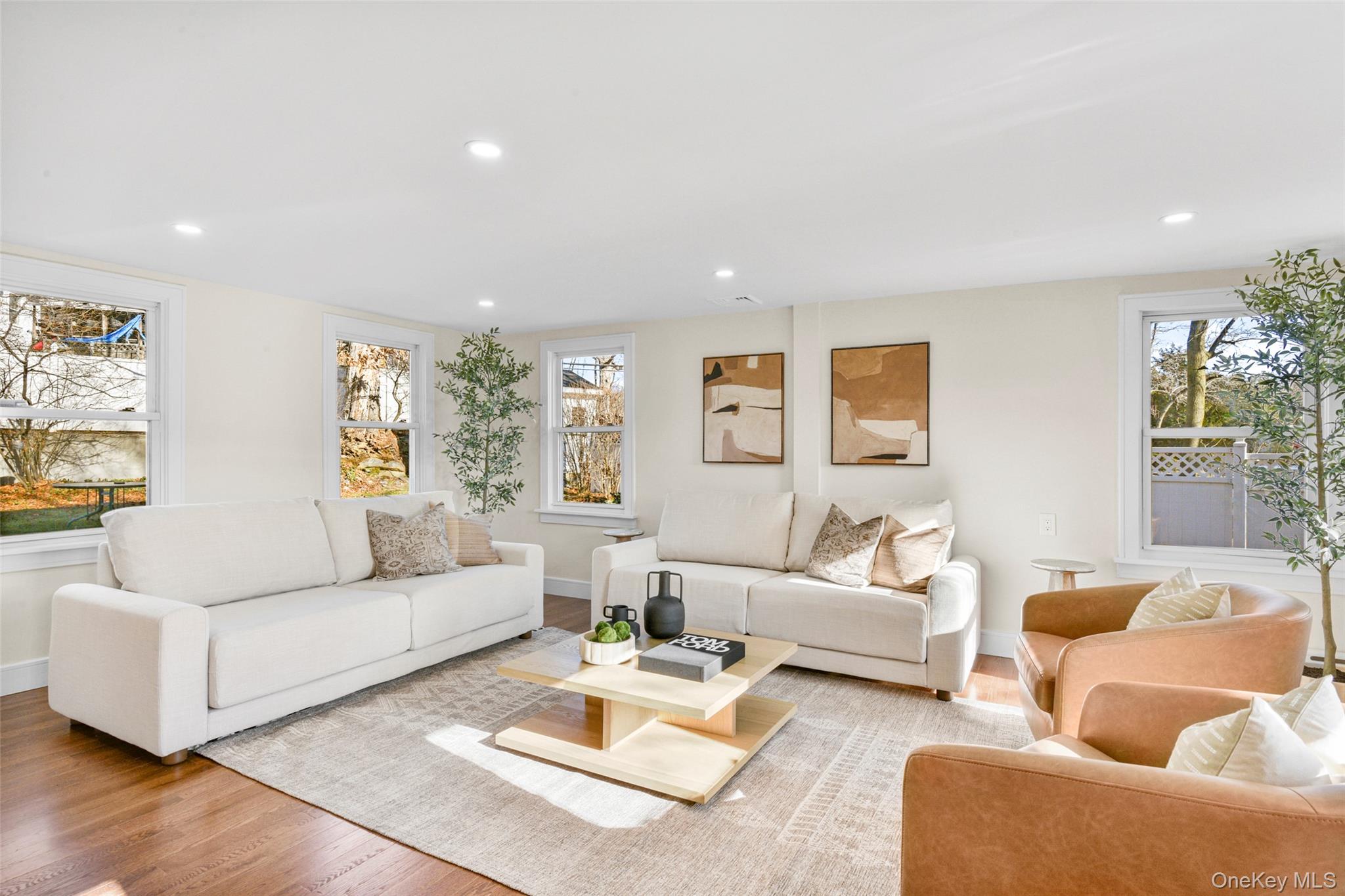 103 Old White Plains Road Tarrytown, NY 10591 - Photo 8 of 37 a living room with furniture and a large window
