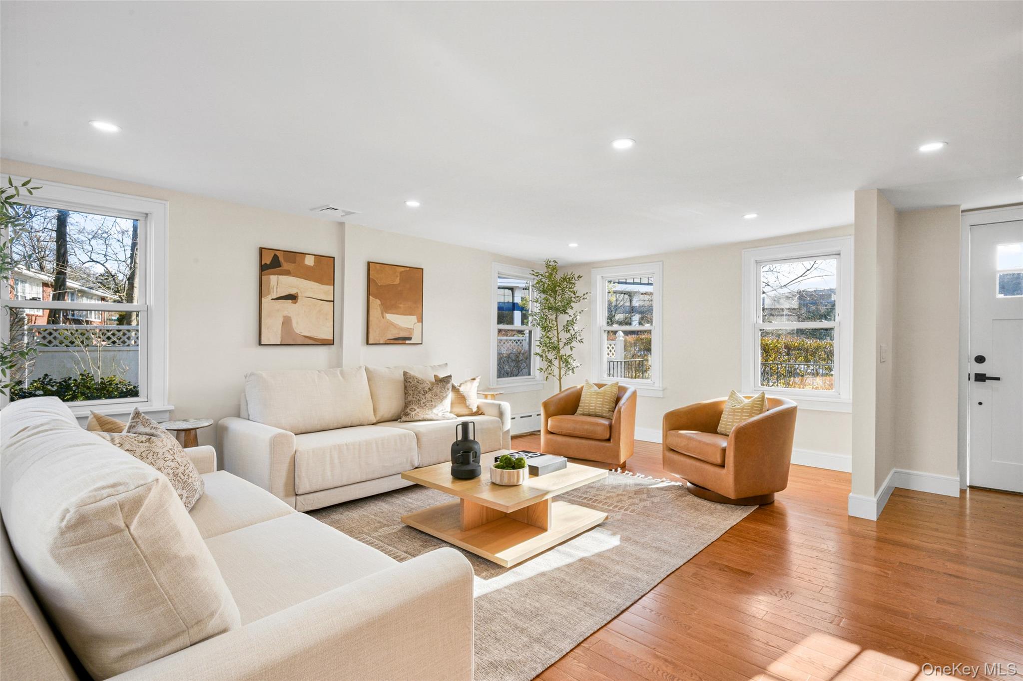 103 Old White Plains Road Tarrytown, NY 10591 - Photo 10 of 37 a living room with furniture rug and window