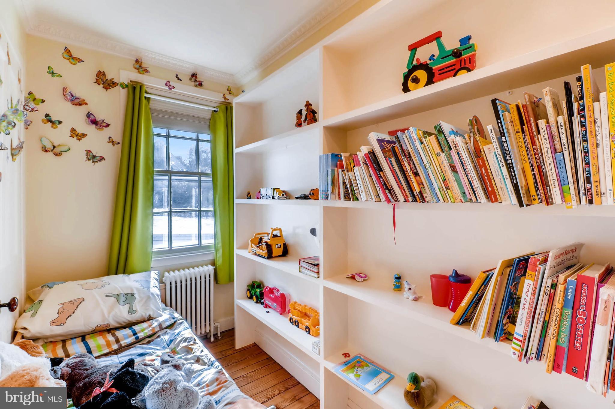 2326 Pickwick Road Baltimore, MD 21207 - Photo 22 of 30 a room with toys and a book shelf