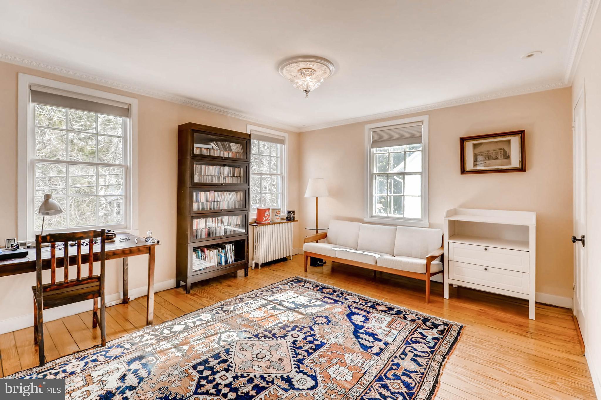2326 Pickwick Road Baltimore, MD 21207 - Photo 23 of 30 a living room with furniture and a window