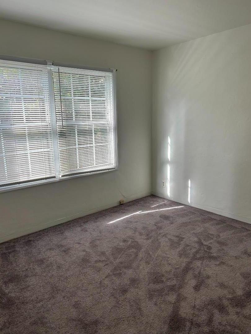 231 Paramount Drive Millbrae, CA 94030 - Photo 5 of 9 an empty room with a window