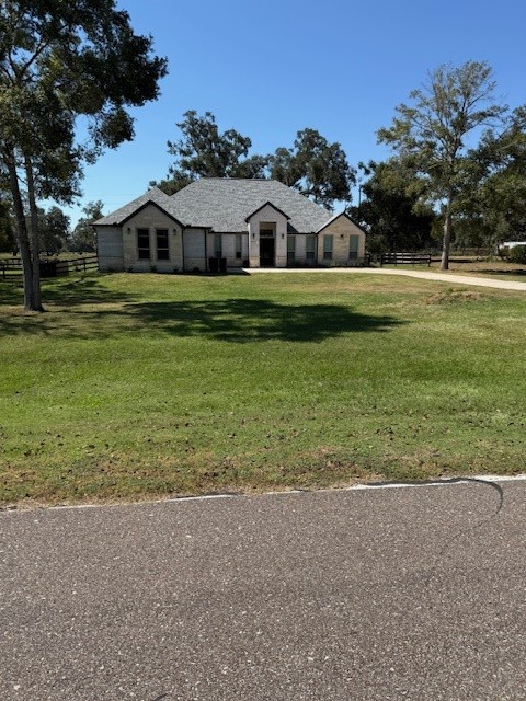 21603 Chenango Lake Drive Angleton, TX 77515 - Photo 6 of 14 a view of a house with a yard