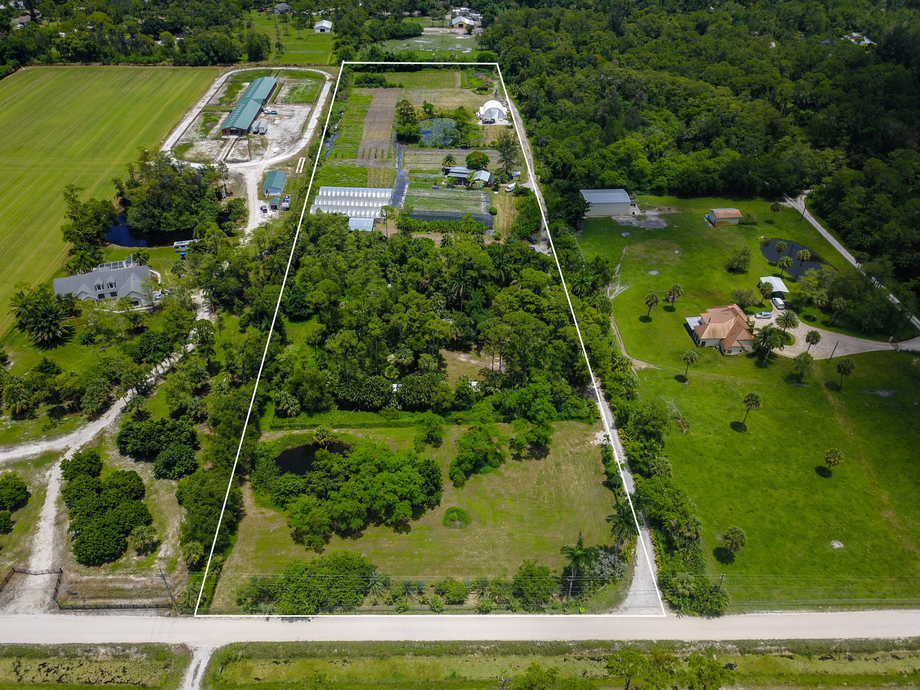 1442 E Road Loxahatchee Groves, FL 33470 - Photo 1 of 23 DJI_0062-Edit
