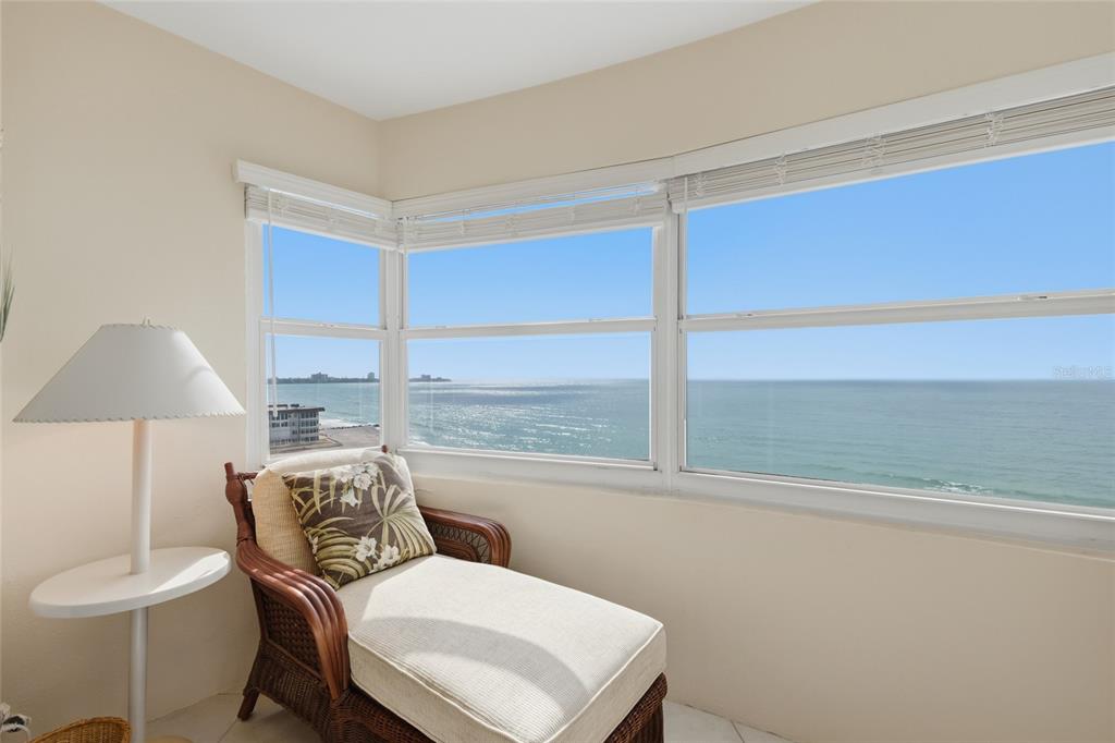 1750 Benjamin Franklin Drive, Unit 9B Sarasota, FL 34236 - Photo 18 of 47 a living room with furniture and a window
