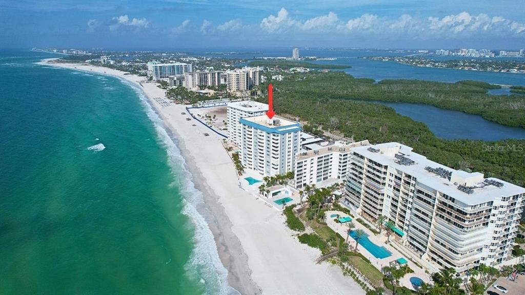 1750 Benjamin Franklin Drive, Unit 9B Sarasota, FL 34236 - Photo 2 of 47 a view of a city with an ocean view