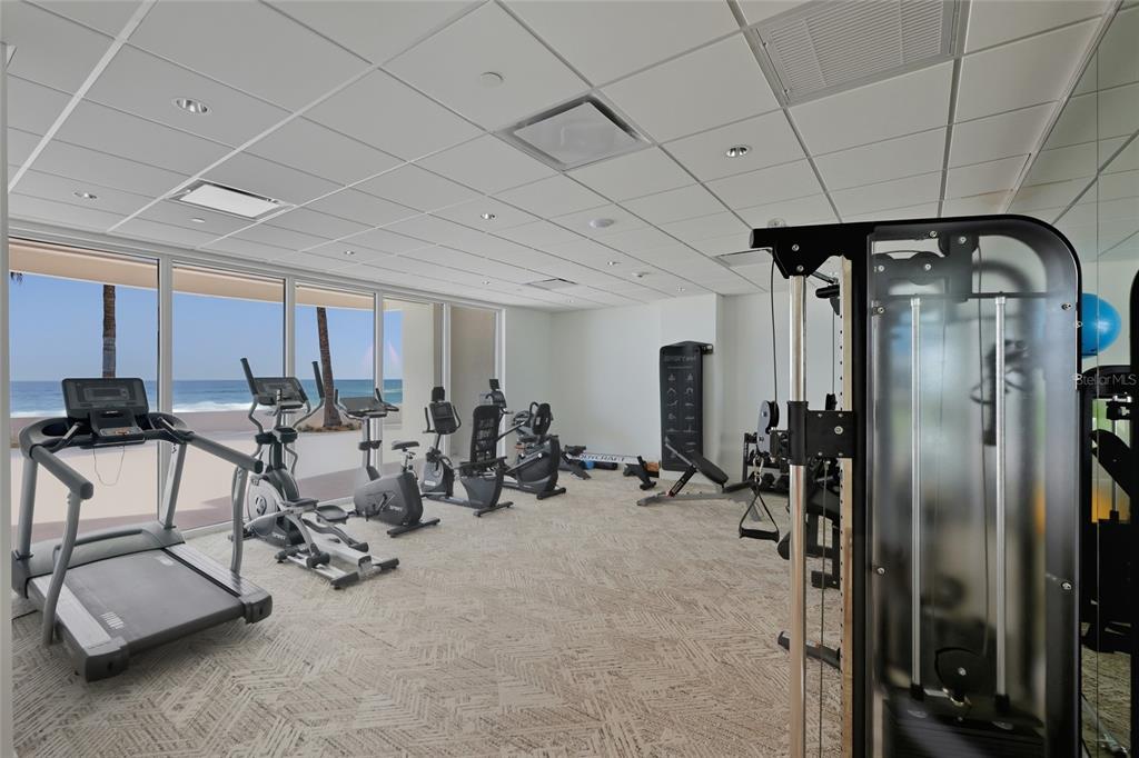 1750 Benjamin Franklin Drive, Unit 9B Sarasota, FL 34236 - Photo 29 of 47 a view of a room with gym equipment