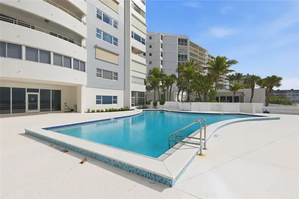 a view of a building with a swimming pool