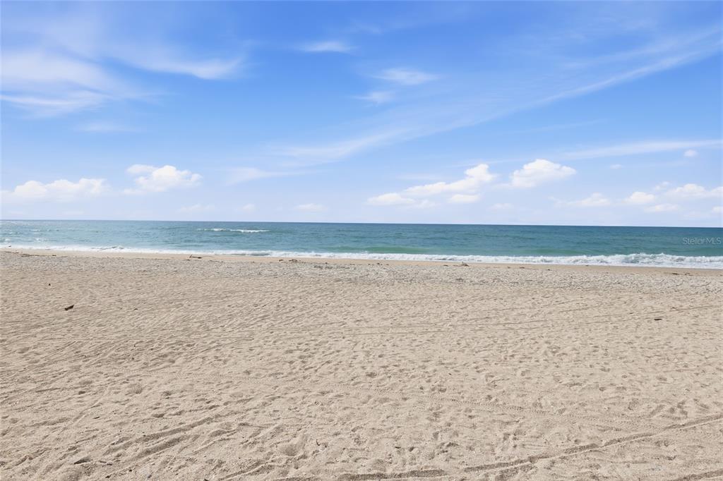 1750 Benjamin Franklin Drive, Unit 9B Sarasota, FL 34236 - Photo 35 of 47 a view of an ocean and beach