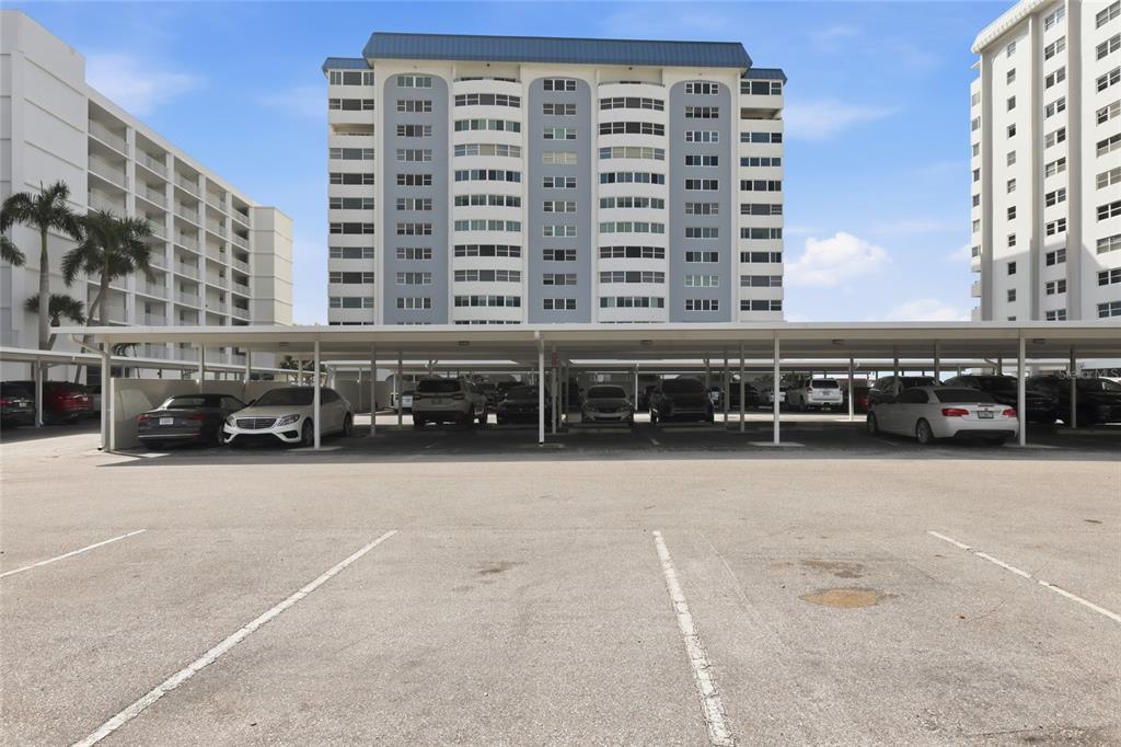1750 Benjamin Franklin Drive, Unit 9B Sarasota, FL 34236 - Photo 36 of 47 a view of building with cars