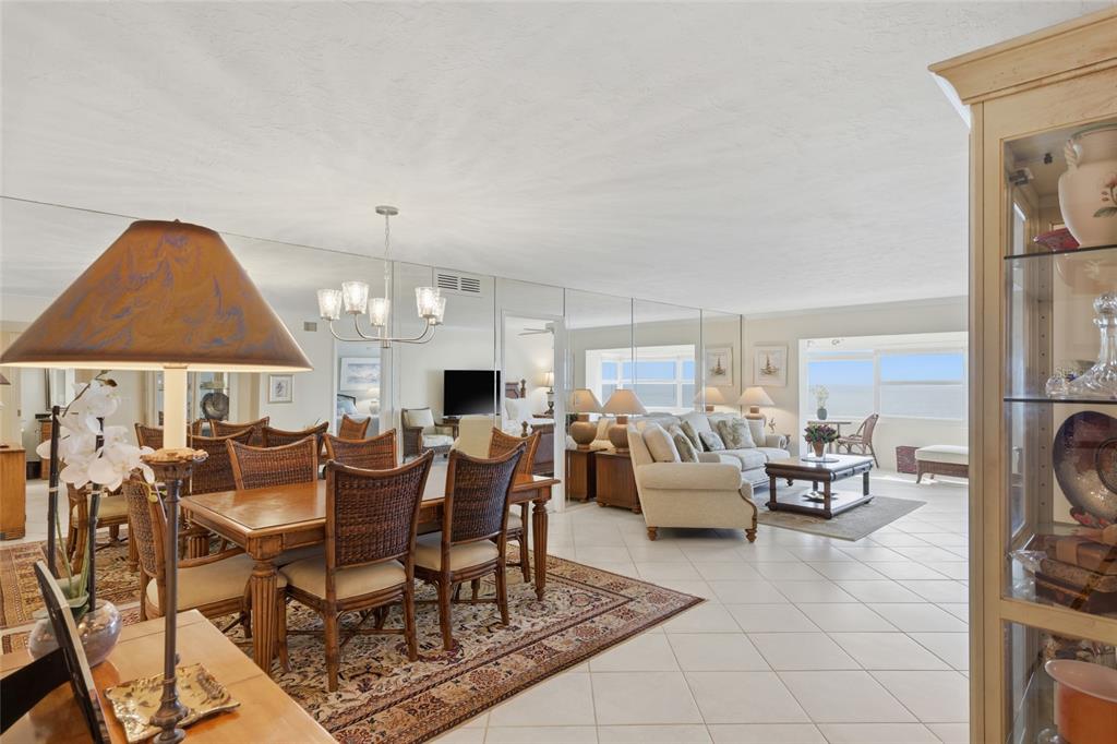 1750 Benjamin Franklin Drive, Unit 9B Sarasota, FL 34236 - Photo 8 of 47 a view of a dining room with furniture