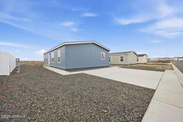 a house view with a backyard space