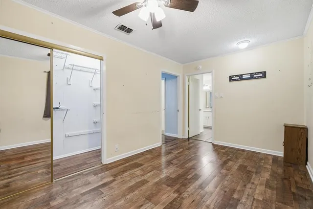a bathroom with a sink vanity and a mirror