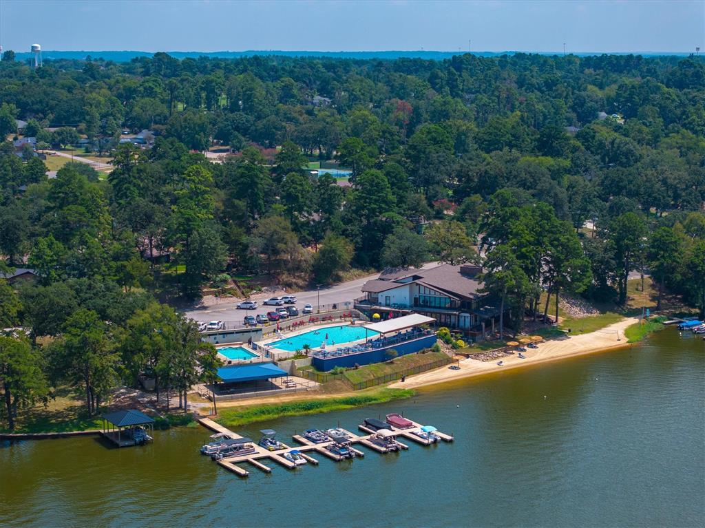 323 Rustic Road Hideaway, TX 75771 - Photo 33 of 40 an aerial view of a house with a garden and lake view