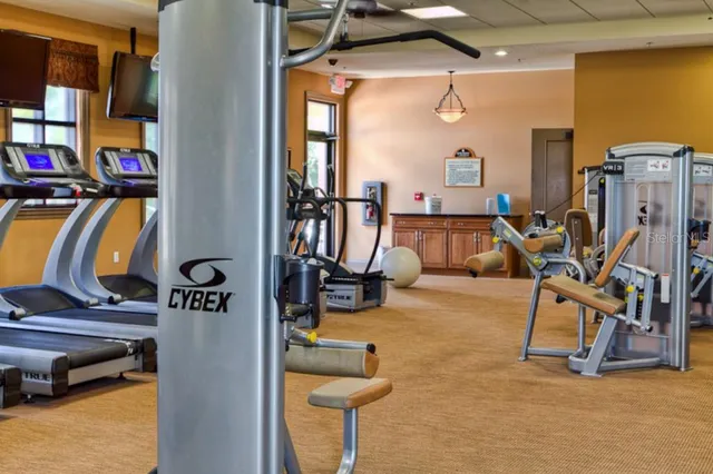 a view of gym equipment and children play room