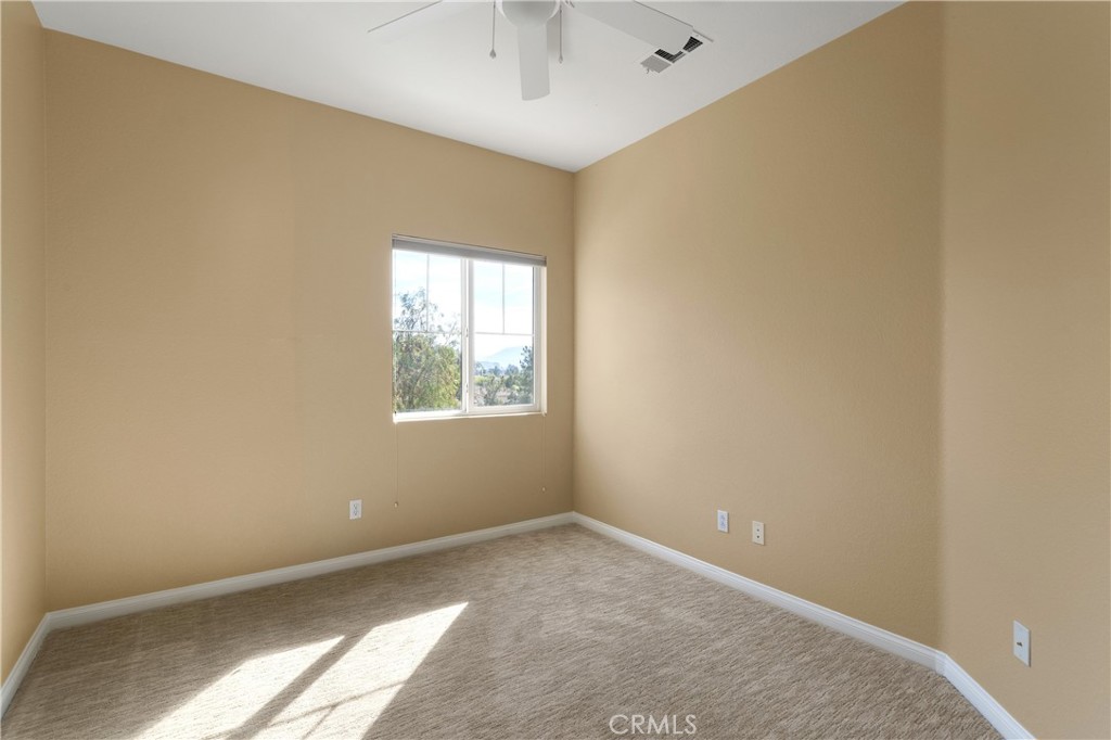 28817 Edenton Way Temecula, CA 92591 - Photo 34 of 56 an empty room with a window