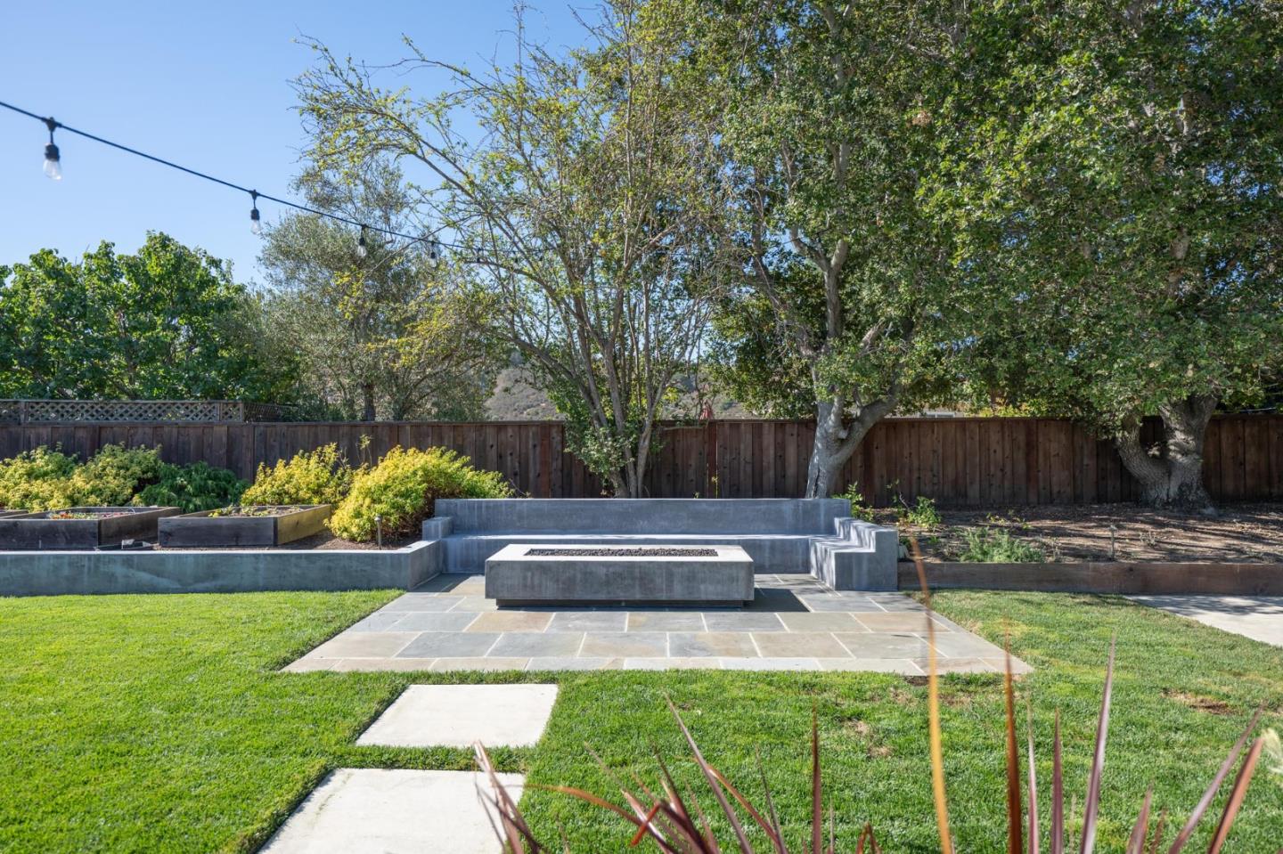 1208 Alomar Way Belmont, CA 94002 - Photo 13 of 18 a view of a backyard with sitting area