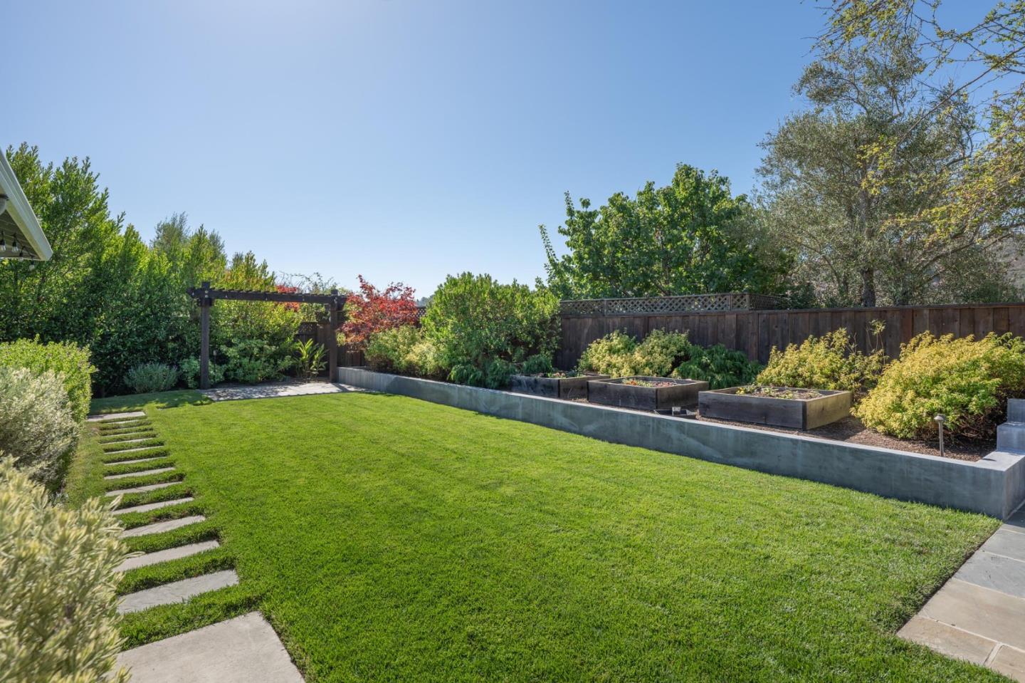 1208 Alomar Way Belmont, CA 94002 - Photo 16 of 18 a view of a garden with wooden stairs