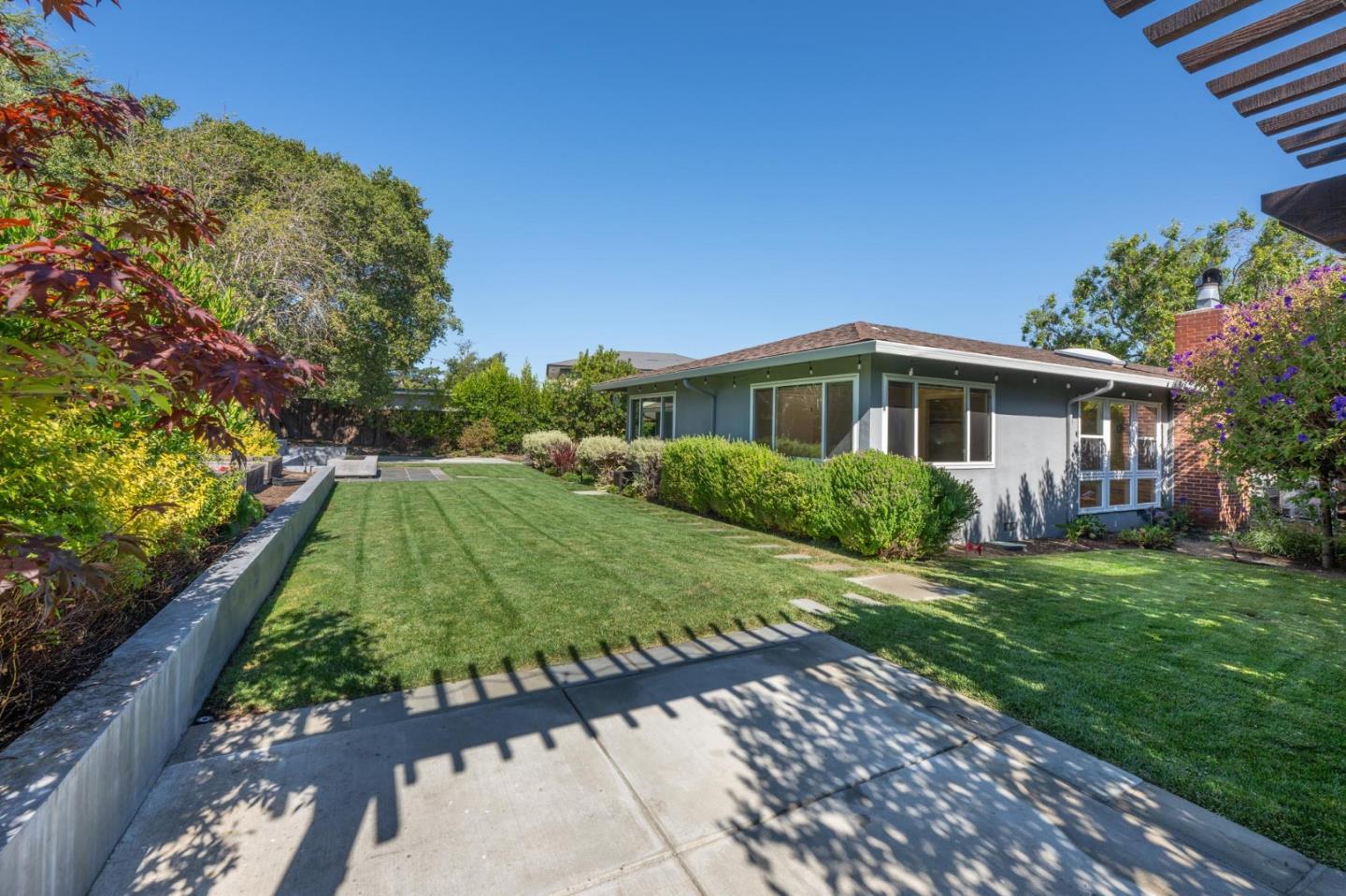1208 Alomar Way Belmont, CA 94002 - Photo 18 of 18 a view of a backyard with a garden