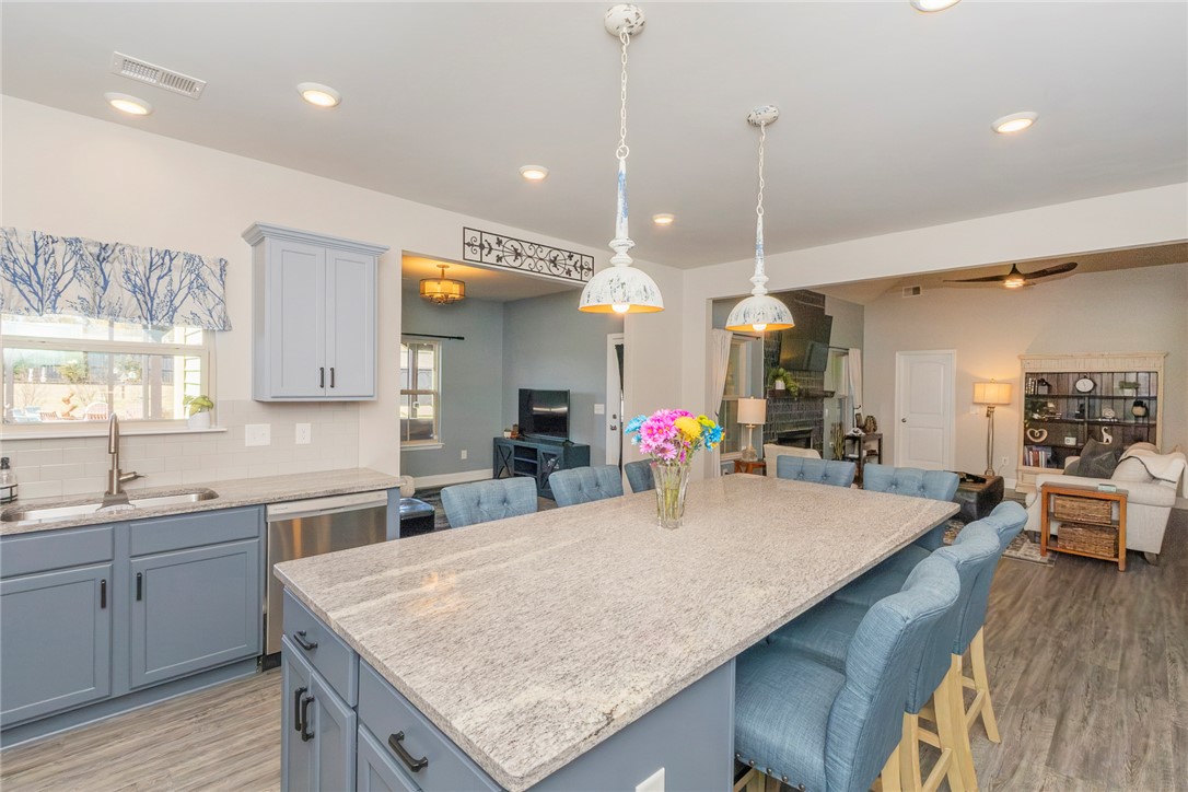 203 Graceview West Anderson, SC 29625 - Photo 13 of 50 This open concept kitchen features a large island and seamless flow into the inviting living area.
