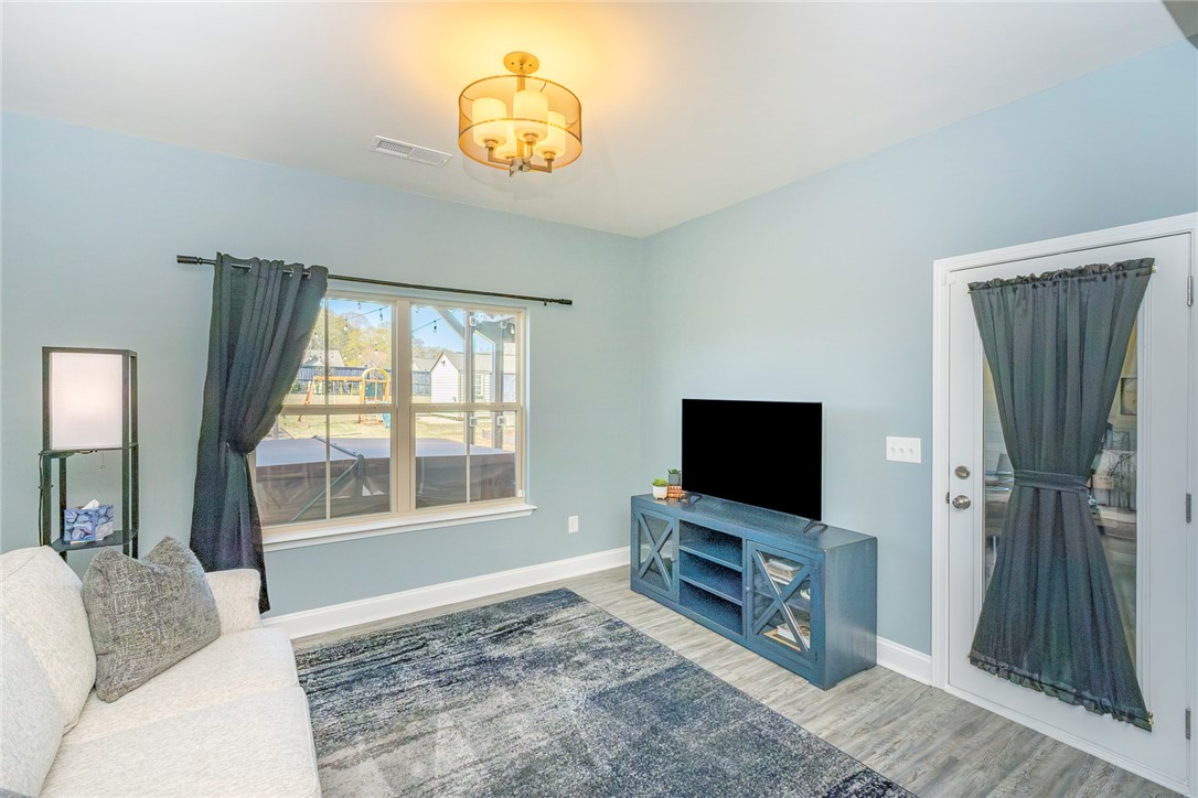 203 Graceview West Anderson, SC 29625 - Photo 15 of 50 Bright and airy living area with ample natural light, perfect for relaxation and everyday living.